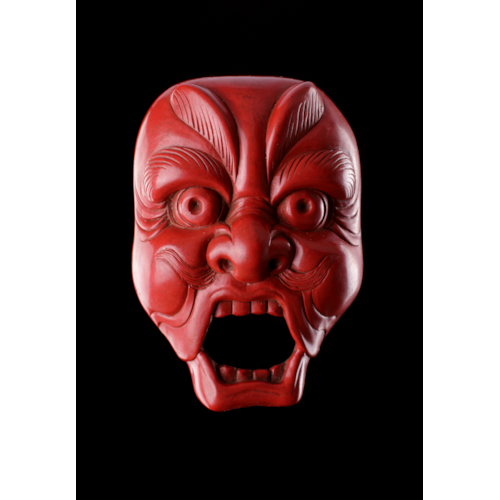 A Very Fine and Unusual Carved Red Lacquer Netsuke